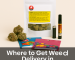 Display of cannabis flower, edibles, and vape cartridges in front of government-approved THC packaging.